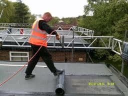 DPR repair flat roof at Leeds apartment block